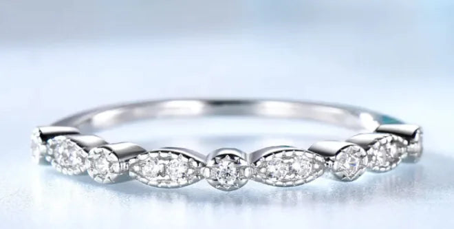 Ever Elegant Wears' Simple silver, diamond ring.